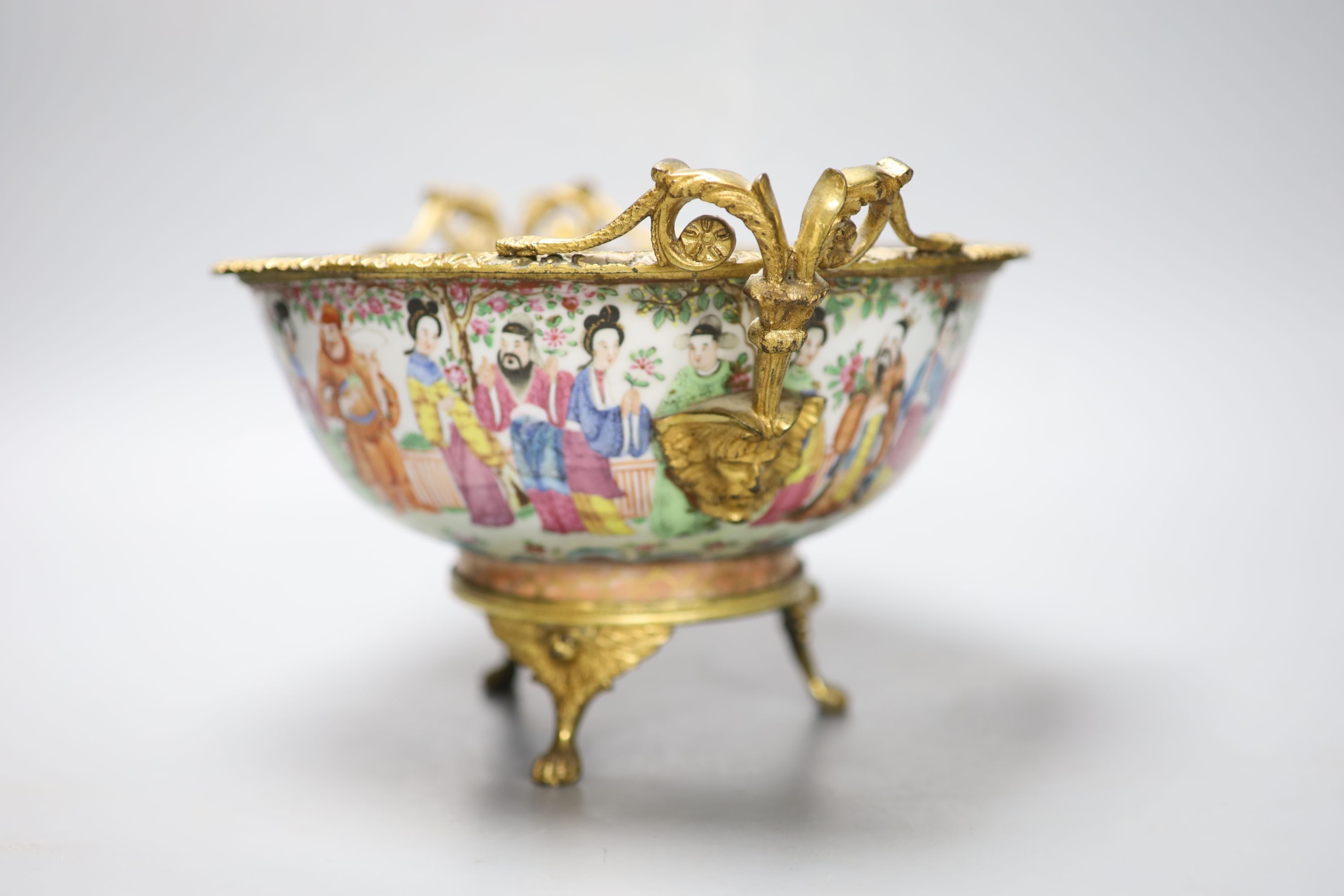 An early 19th century Chinese ormolu mounted famille rose bowl, 30cm handle to handle